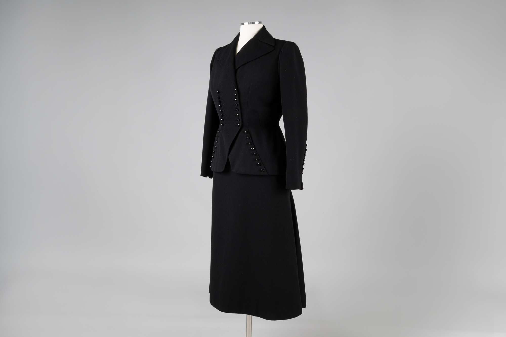 Image of Black faille skirt suit, 1951